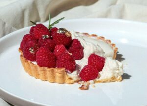 strawberry cake on white ceramic plate